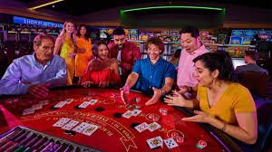 Live blackjack dealer at topslot88 login studio dealing cards with real-time betting interface